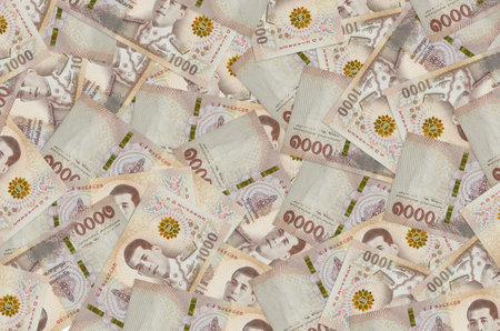 1000 Thai baht bills lies in big pile. Rich life conceptual background. Big amount of money