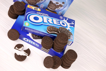 KHARKOV, UKRAINE - NOVEMBER 24, 2020: Oreo sandwich cookies and blue product boxes on white table. Oreo is a sandwich cookie with a sweet cream is the best selling cookie in the USのeditorial素材