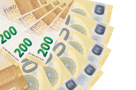 200 euro bills lies isolated on white background with copy space stacked in fan shape close up....