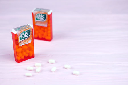 KHARKOV, UKRAINE - NOVEMBER 24, 2020: Tic tac drops with orange flavor. Tic tacs are manufactured by...
