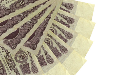 25 russian rubles bills lies isolated on white background with copy space stacked in fan shape close...