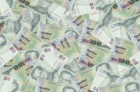 20 Thai Baht bills lies in big pile. Rich life conceptual background. Big amount of moneyの写真素材