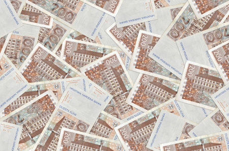 200 Croatian kuna bills lies in big pile. Rich life conceptual background. Big amount of money