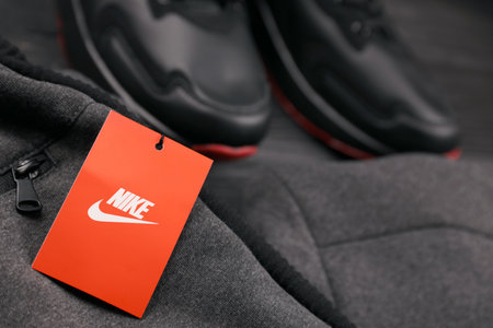 KHARKOV, UKRAINE - DECEMBER 20, 2020: Nike brand clothes and shoes sportwear kit. Nike is American multinational corporation engaged in manufacturing and worldwide marketing of clothes and footwearのeditorial素材