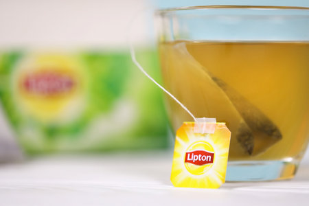 KHARKOV, UKRAINE - DECEMBER 8, 2020: Lipton classic green tea bags. Lipton is a British brand of tea owned by Unilever and PepsiCo companyのeditorial素材