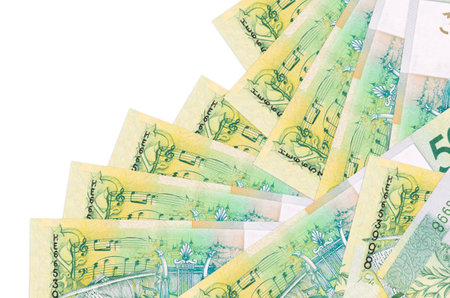 50 Belorussian rubles bills lies in different order isolated on white. Local banking or money making...