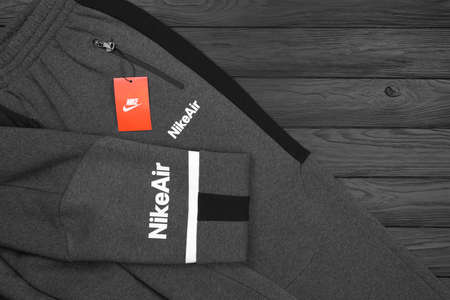 KHARKOV, UKRAINE - DECEMBER 20, 2020: Nike brand clothes sportwear kit. Nike is American multinational corporation engaged in manufacturing and worldwide marketing of clothes and footwearのeditorial素材