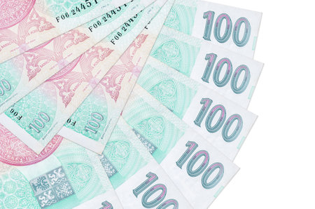 100 Czech korun bills lies isolated on white background with copy space stacked in fan shape close...