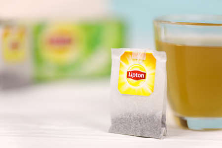 KHARKOV, UKRAINE - DECEMBER 8, 2020: Lipton classic green tea bags. Lipton is a British brand of tea owned by Unilever and PepsiCo companyのeditorial素材
