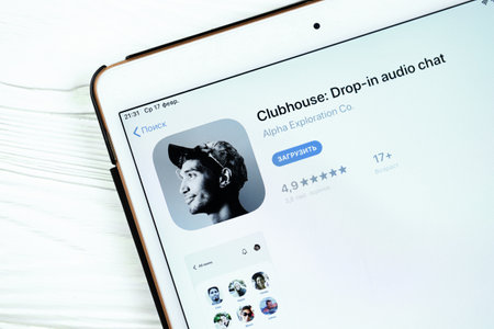 KHARKOV, UKRAINE - FEBRUARY 14, 2021: Clubhouse app in app store market on ipad display screen....