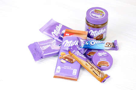 KHARKOV, UKRAINE - JULY 2, 2021: Milka chocolate products with classical lilac color wrapping design...