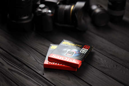 KHARKOV, UKRAINE - JANUARY 12, 2021: SanDisk Extreme pro sdhc 32gb new memory card for photo cameras and video recording devicesのeditorial素材