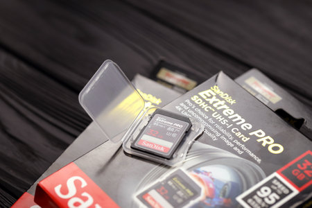 KHARKOV, UKRAINE - JANUARY 12, 2021: SanDisk Extreme pro sdhc 32gb new memory card for photo cameras...