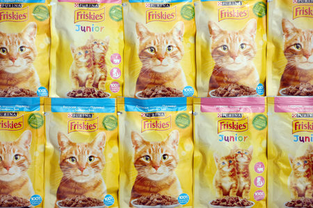 KHARKOV, UKRAINE - AUGUST 10, 2021: Many Friskies packs of pets meal. Friskies owned by Nestle Purina PetCare Company, a subsidiary of Nestle globalのeditorial素材