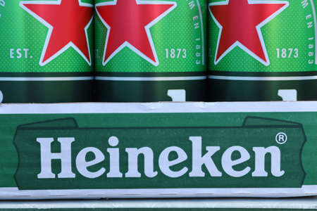 KHARKOV, UKRAINE - JULY 31, 2021: Green tin cans of Heineken pale lager beer produced by the Dutch brewing company Heineken NVのeditorial素材