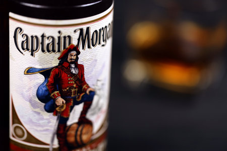 KHARKOV, UKRAINE - DECEMBER 3, 2020: Captain Morgan original spiced gold spirit drink bottle on dark...