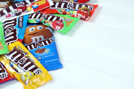 KHARKOV, UKRAINE - MARCH 15, 2021: MM's chocolate candies packs with various tastes and design. MM's...