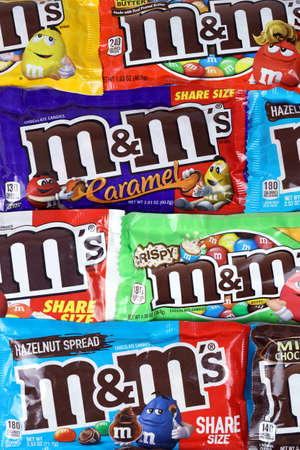 KHARKOV, UKRAINE - MARCH 15, 2021: MM's chocolate candies packs with various tastes and design. MM's produced by Mars Incorporated since 1941のeditorial素材