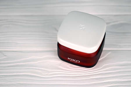 KHARKIV, UKRAINE - DECEMBER 16, 2021: Kiko Milano cream jar with company logo. Kiko Milano is a famous Italian cosmetics brandのeditorial素材