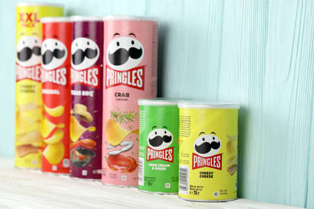 KHARKIV, UKRAINE - DECEMBER 16, 2021: Pringles production with new logo. Pringles is a brand of...