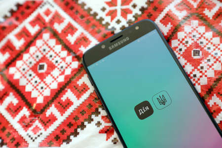 TERNOPIL, UKRAINE - APRIL 24, 2022: Diia app on smartphone screen. Diya is a mobile application with web portal and a brand of e-governance in Ukraine for citizensのeditorial素材