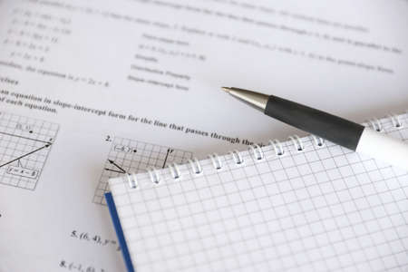 Handwriting of geometrical tasks on examination, practice, quiz or test in geometry class. Solving...