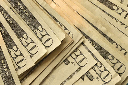 Big amount of old 20 dollar bills details on macro photography. Money earnings, payday or tax paying...