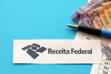 TERNOPIL, UKRAINE - MAY 20, 2022: Brazilian Receita Federal logo printed on paper. Receita Federal is the Brazilian federal revenue service agency and a secretariat of the Ministry of the Economyのeditorial素材