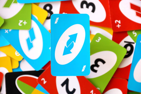 TERNOPIL, UKRAINE - MAY 15, 2022: Many colorful UNO game cards. UNO is an American shedding-type card game that is played with a specially printed deck. UNO has been a Mattel brand since 1992のeditorial素材