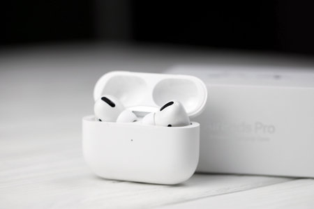 KHARKIV, UKRAINE - JANUARY 27, 2021: Apple AirPods Pro on a white background. Wireless headphones...