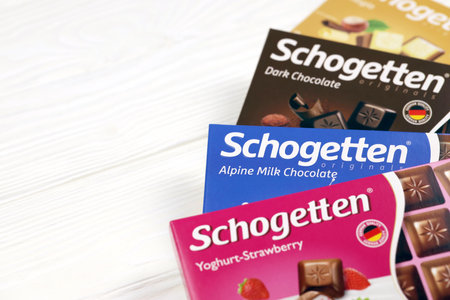 KHARKIV, UKRAINE - DECEMBER 18, 2020: Schogetten chocolate packs. Dark Chocolate produced by Ludwig Schokolade GmbH and Co. KG, one of Europe's most successful confectionery suppliersのeditorial素材