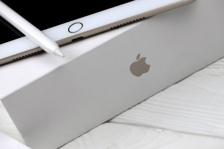 KHARKIV, UKRAINE - JANUARY 27, 2021: Brand new Apple iPad and Apple Pencil on white background. Apple Inc. is an American technology company headquartered in Californiaのeditorial素材