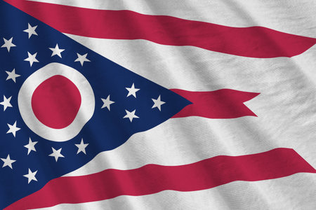 Ohio US state flag with big folds waving close up under the studio light indoors. The official symbols and colors in fabric bannerの写真素材