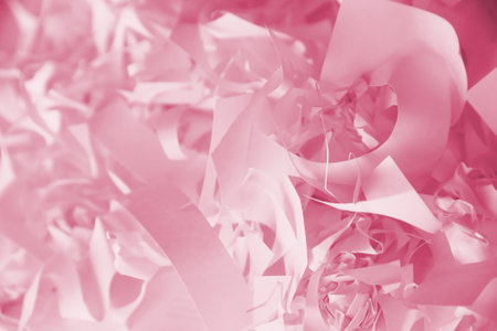 Shredded paper texture background, top view of many white paper strips. Pile of cut paper like...