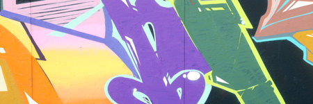 Colorful background of graffiti painting artwork with bright aerosol strips on metal wall. Old...
