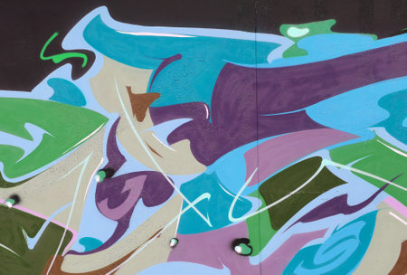Colorful background of graffiti painting artwork with bright aerosol strips on metal wall. Old...