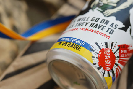 KYIV, UKRAINE - MAY 4, 2022 Localy brewed beer called Fights will go on as long as they have to featuring president Volodymyr Zelensky an prominent Ukrainians on tin canのeditorial素材