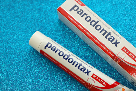 KYIV, UKRAINE - MAY 4, 2022 Package of Parodontax toothpaste on bright background close up