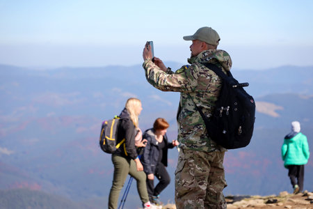 CARPATHIAN MOUNTAINS, UKRAINE - OCTOBER 8, 2022 Mount Hoverla. Carpathians in Ukraine in autumn. Tourists climb to the top of the mountain. Picturesque landscape panorama view of the Chornogora ridgeのeditorial素材