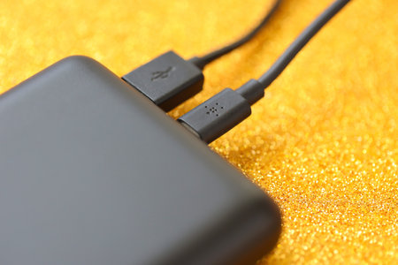 KYIV, UKRAINE - MAY 4, 2022 Portable Powerbank battery with logo of Belkin International, american manufacturer of consumer electronics that specializes in connectivity devicesのeditorial素材