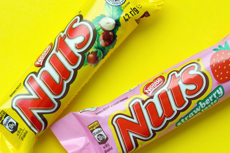KYIV, UKRAINE - MAY 4, 2022 Nuts original chocolate bar manufactured by Nestle company. Small...