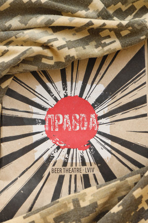 KYIV, UKRAINE - MAY 4, 2022 Logo of Pravda patriotic Ukrainian beverage company on cardboard pack...