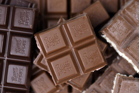 KYIV, UKRAINE - MAY 4, 2022 Ritter Sport chocolate bars with various tastes without wrappings. Many...