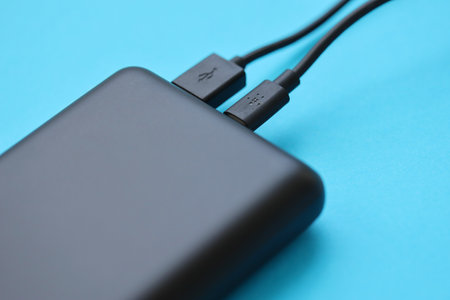KYIV, UKRAINE - MAY 4, 2022 Portable Powerbank battery with logo of Belkin International, american manufacturer of consumer electronics that specializes in connectivity devicesのeditorial素材