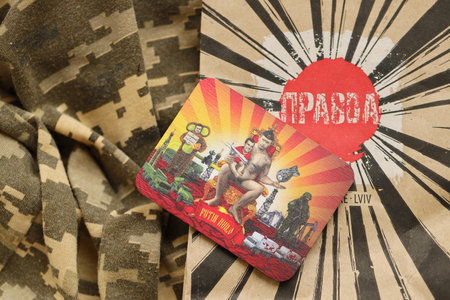 KYIV, UKRAINE - MAY 4, 2022 Putin Huilo souvenir from Pravda beverage company with funny design about russian president Putin, nuclear bomb and trucks full of dead russian soldiersのeditorial素材