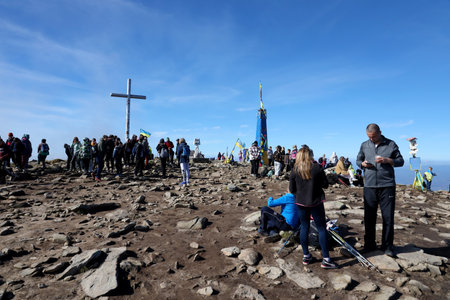 CARPATHIAN MOUNTAINS, UKRAINE - OCTOBER 8, 2022 Mount Hoverla. Carpathians in Ukraine in autumn. Tourists climb to the top of the mountain. Picturesque landscape panorama view of the Chornogora ridgeのeditorial素材