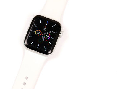 KYIV, UKRAINE - MAY 4, 2023: Apple Watch series five 5 on white background close upのeditorial素材