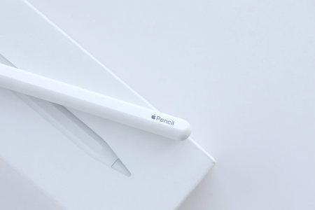 KYIV, UKRAINE - MAY 4, 2023: New Apple pencil generation 2. Features a flat edge that attaches magnetically for automatic charging and pairing close upのeditorial素材