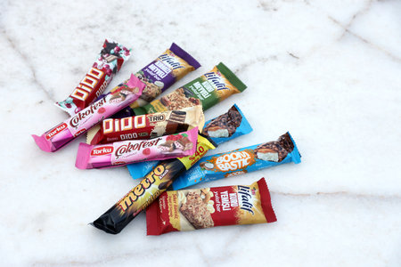 ANTALYA, TURKEY - MAY 18, 2021 Many tasty chocolate bars of various local turkish manufacturers. Typical products from common turkish supermarketsのeditorial素材