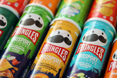 KYIV, UKRAINE - JULY 7, 2023 Pringles passport edition chips cans with different taste and flavourのeditorial素材
